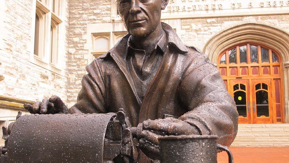 A statue of alumnus and World War II correspondent Ernie Pyle typing on his typewriter sits in front of Franklin Hall. The building houses IU Student Media, including the Indiana Daily Student.&nbsp;