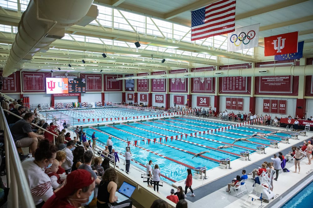 Spectators observe the Indiana University vs. Evansville swim meet on Jan. 28, 2022 at the Counsilman Billingsley Aquatic Center. Four Hoosier swim and dive athletes earned conference honors this week.