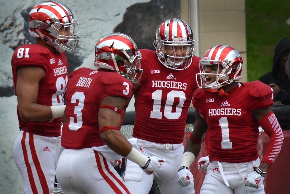 Senior wide receiver Shane Wynn celebrates after scoring a touchdown in IU's homecoming game against Michigan State on Saturday at Memorial Stadium.