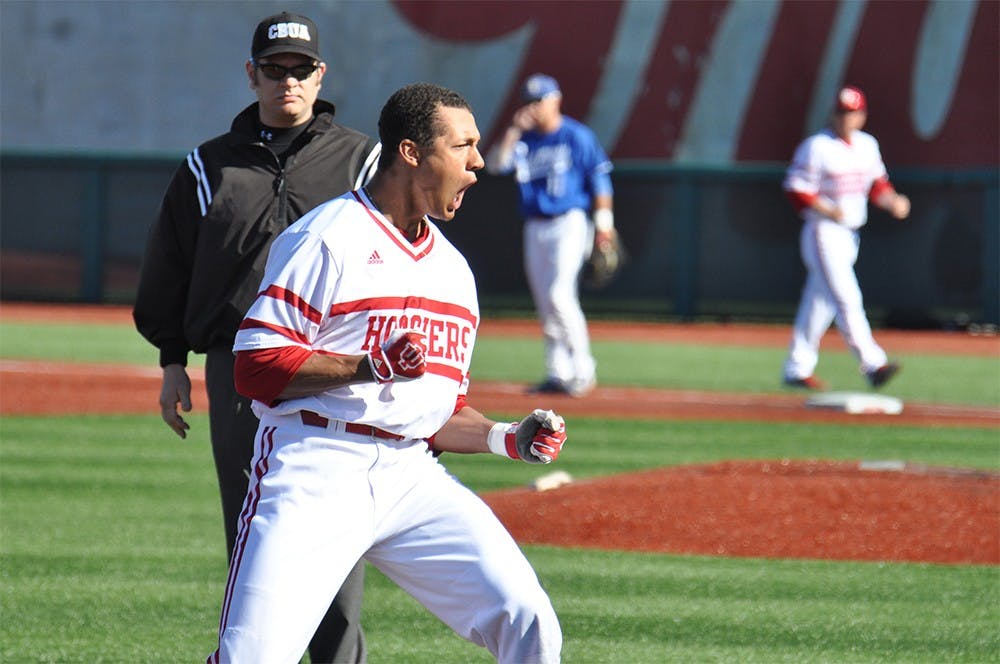 Sophomore infielder Isaiah Pasteur celebrates at third base after his RBI triple tied Saturday's game, 1-1. The Hoosiers lost to Indiana State 4-1.