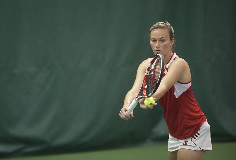 Senior Katie Klyczek prepares to serve against Tereza Brichacova from the University of Minnesota on Sunday at the IU Tennis Center. Klyczek won the match 6-2, 6-0.