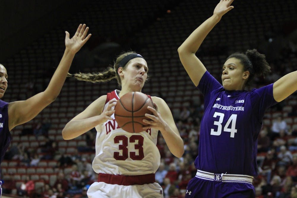 <p>Senior forward Amanda Cahill holds the ball, waiting for a chance to shoot a basket. IU faced Northwestern on Sunday, Feb. 4, at Simon Skjodt Assembly Hall. IU plays at again at home Thursday night against Illinois in hopes of getting its fifth straight win.</p>