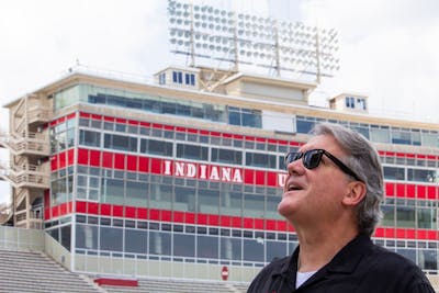 IU Athletic Director Fred Glass looks up at the new south end zone scoreboard July 25, 2018, at Memorial Stadium. Glass joins Bob Knight, Ed Williams, Jerry Yeagley, Lin Loring and Hobie Billingsley as a recipient with ties to IU athletics of the IU President’s Medal for Excellence.