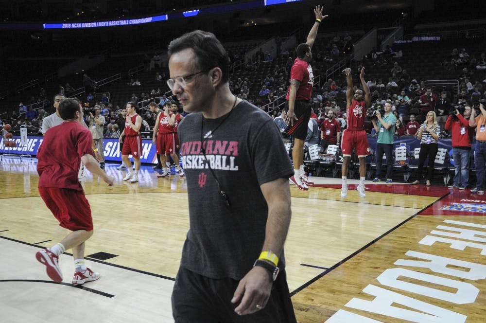 Head Coach Tom Crean walks across the court after instructing senior guard Yogi Ferrell in a shooting drill during practice on Thursday at the Wells Fargo Center. Indiana will play number one seed North Carolina in the Sweet Sixteen round of the NCAA Tournament tomorrow.