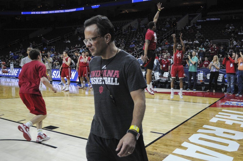 Head Coach Tom Crean walks across the court after instructing senior guard Yogi Ferrell in a shooting drill during practice on Thursday at the Wells Fargo Center. Indiana will play number one seed North Carolina in the Sweet Sixteen round of the NCAA Tournament tomorrow.
