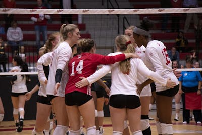 IU volleyball players huddle between points during the fifth set against Iowa on Oct. 26, 2019, at Wilkinson Hall. The NCAA officially passed a waiver Friday to grant an extra year of eligibility to fall sports athletes who had their fall sports season canceled or postponed due to the COVID-19 pandemic.