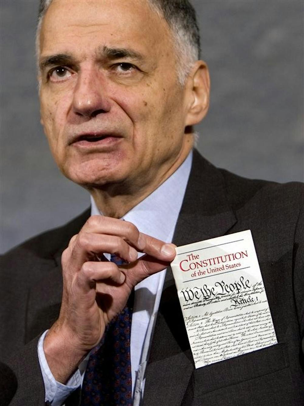 Independent presidential candidate Ralph Nader shows a copy of the U.S. Constitution during a news conference on Sept. 10 at the National Press Club in Washington.