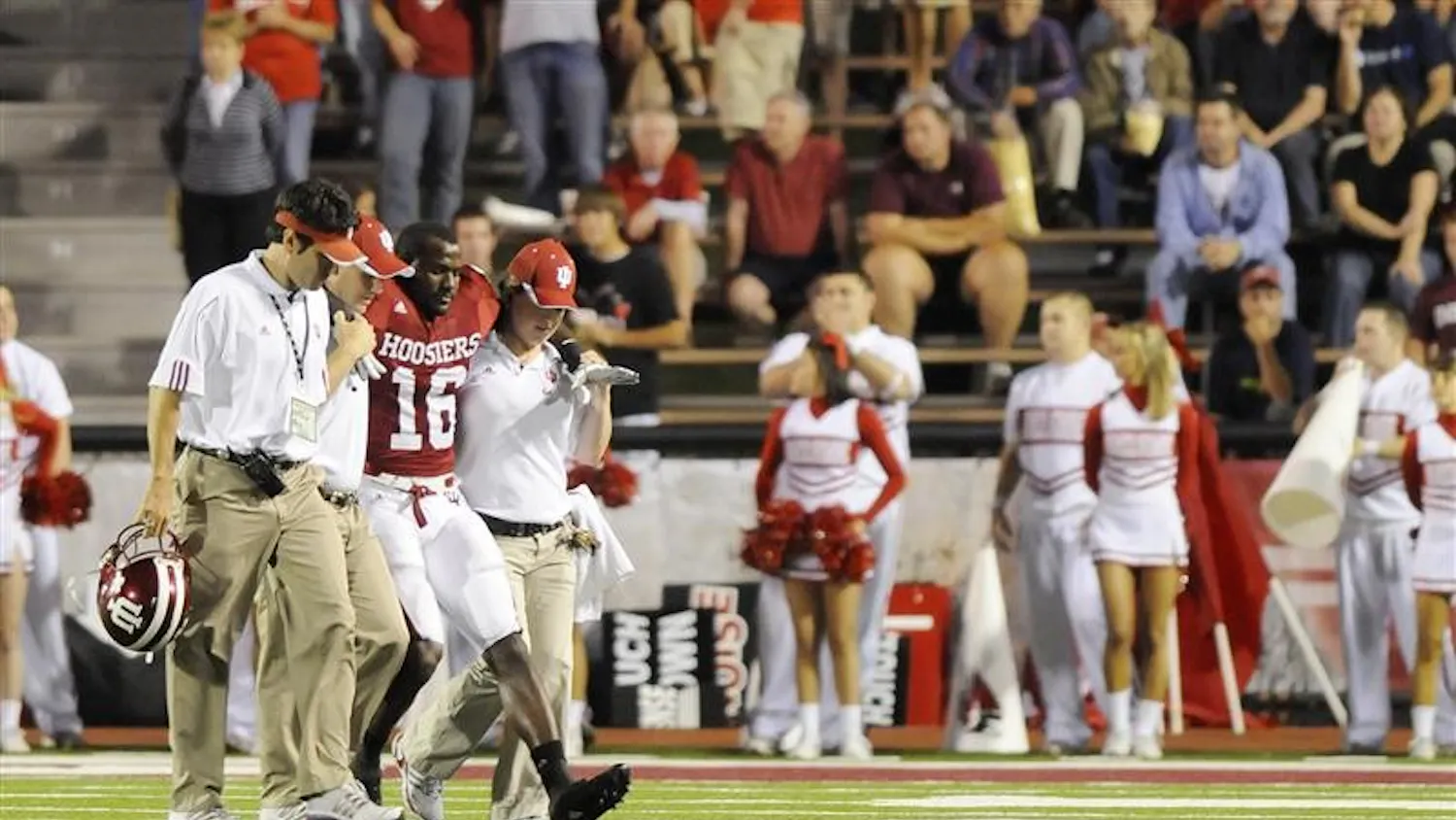 IU cornerback Christopher Phillips is helped off the field during IU's 42-20 loss to Ball State on Saturday night at Memorial Stadium. Phillips will miss the remainder of the season with a torn ACL.