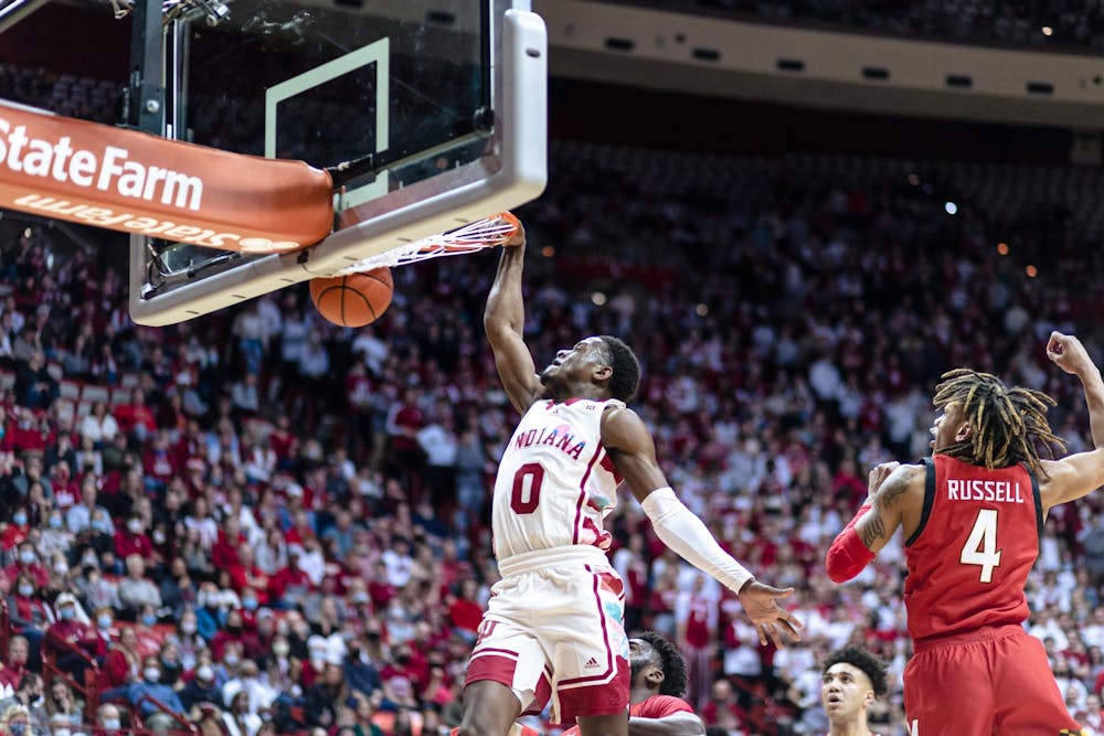 <p>Senior guard Xavier Johnson dunks Feb. 24, 2022, at Simon Skjodt Assembly Hall. Johnson led the way for Indiana with 24 points.</p>