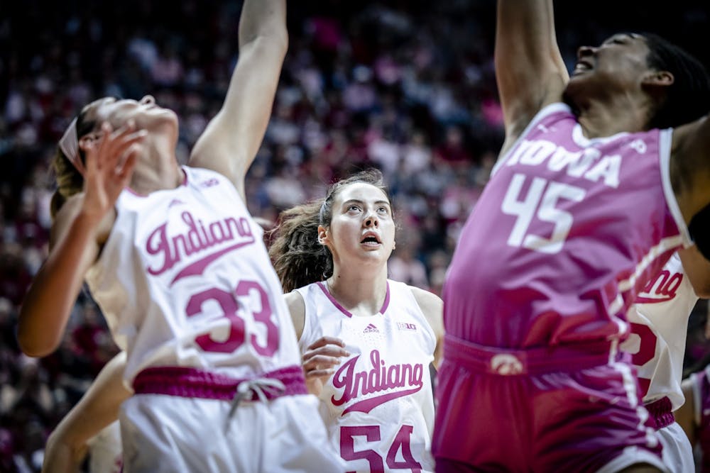 <p>Senior forward Mackenzie Holmes watches Sydney Parrish grab a rebound Feb. 9, 2023, at Simon Skjodt Assembly Hall in Bloomington. Indiana beat Ohio State 83-59 on Monday night.</p>