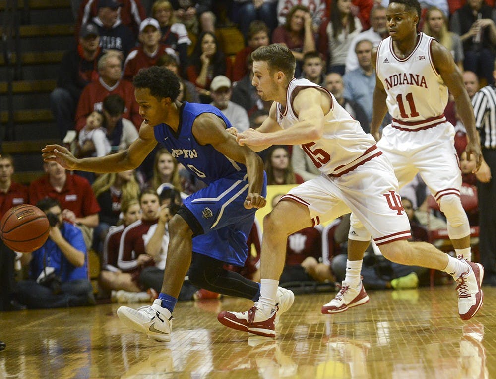 Freshman guard Harrison Niego goes after the ball during the game agaisnt IPFW on Wednesday at Assembly Hall. The Hoosiers defeated the Mastodons 90-65.