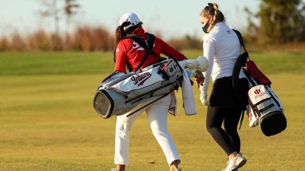 <p>Members of the IU women&#x27;s golf team talk Feb. 21, 2021, after the first day of a tournament in Kiawah Island, South Carolina. New this year, head coach Brian May is looking to bring the Hoosiers up from their 151st ranking after helping the University of Kentucky reach the NCAA championships after 29 years.</p>