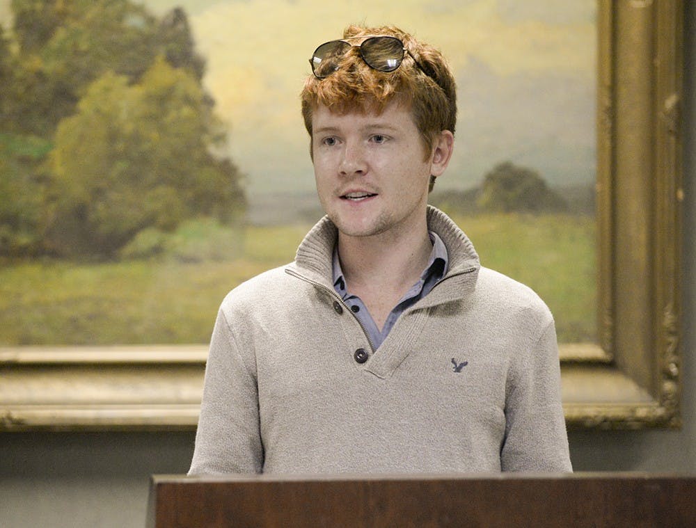 Graduate student Ben Cowley talks about changing the default setting on university computers to print double-sided in an effort to save money on printer paper while at the IUSA meeting Monday at State Room West in the Indiana Memorial Union.