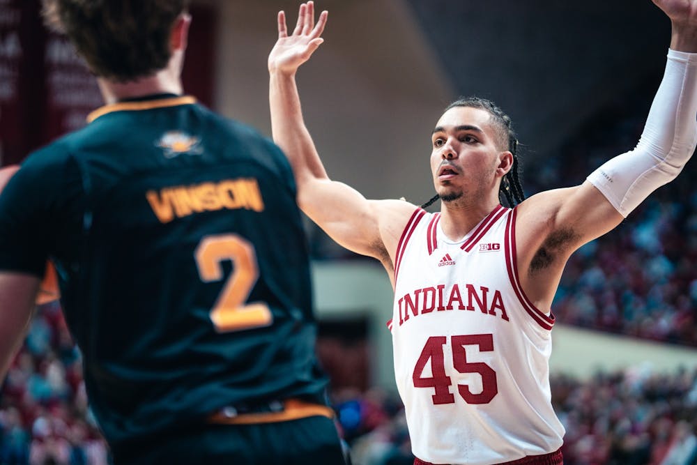 <p>Junior guard Parker Stewart guards plays defense Dec. 22, 2021, at Simon Skjodt Assembly Hall. Stewart announced he would not be returning to Indiana next year via his Twitter on Thursday night.</p>