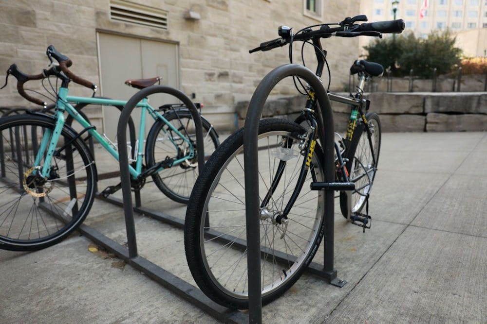 <p>Several bikes are parked outside on IU’s campus.</p>