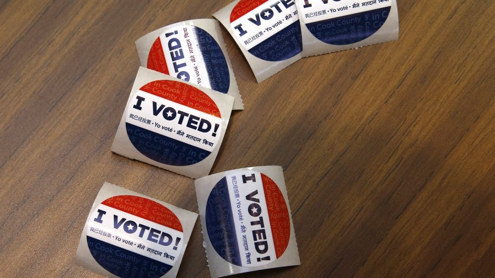 Voting stickers at First Presbyterian Church in River Forest on Tuesday, March 15, 2016 in Chicago. The shape and size of these stickers varies by state and county.&nbsp;