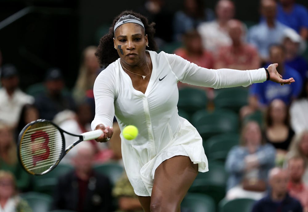 <p>Serena Williams plays a forehand against France&#x27;s Harmony Tan during their first-round Wimbledon match at All England Lawn Tennis and Croquet Club on June 28 in London. She announced her retirement from the sport on Aug. 9.</p>