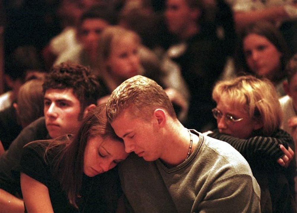 Students from Columbine High School in Littleton, Colo., fill the front rows of Light Of The World Catholic Church for a prayer vigil April 20, 1999.  The students were the victims of a shooting rampage at the high school outside Denver. 