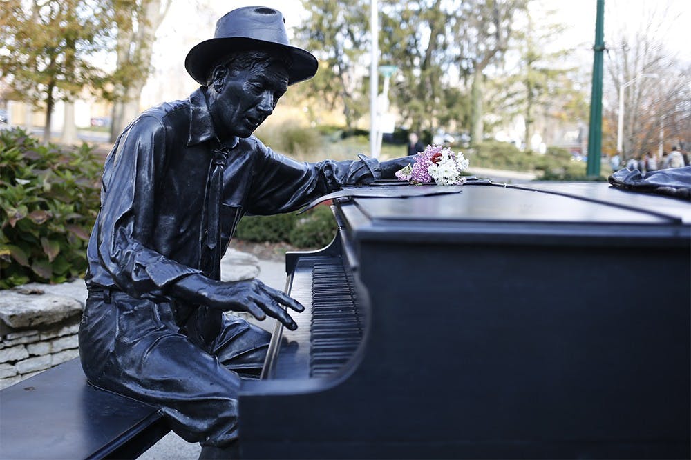 A statue of Hoagy Carmichael sits outside of IU Cinema in honor of his achievements as a composer, musician and actor.