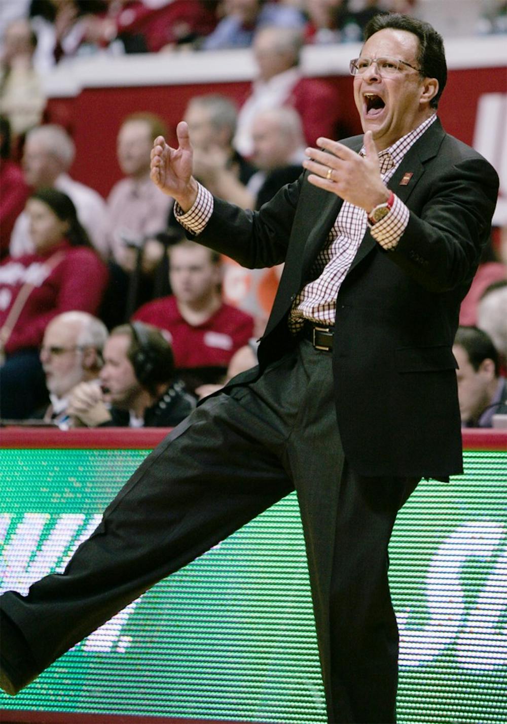 Head coach Tom Crean yells to the crowd to get on their feet to cheer on the Hoosiers on Feb. 16 at Assembly Hall.