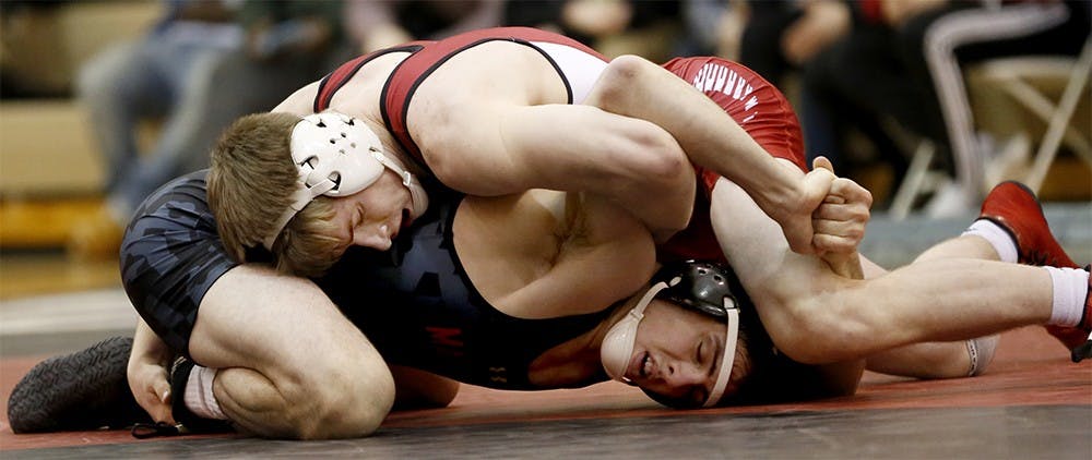 Then-freshman, now senior, Bryce Martin wrestles against Maryland during the 2015-16 season at the University Gym.