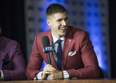 Collin Hartman laughs while being interviewed live on the Big Ten Network at Madison Square Garden on Thursday. Hartman is one of five seniors of the 2017-18 IU men's basketball roster.&nbsp;