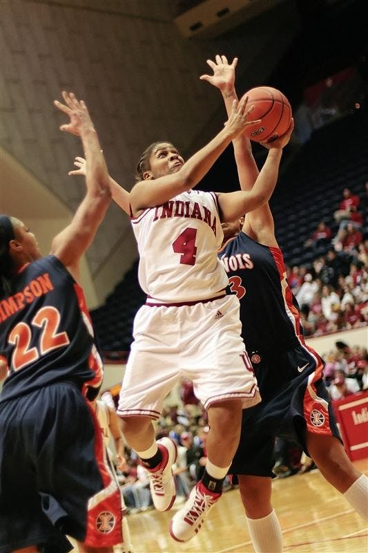 Freshman guard Ashlee Mells splits the Illinois defense on her way to the hoop during the Hoosiers 66-59 loss to Illinois Sunday afternoon at Assembly Hall.