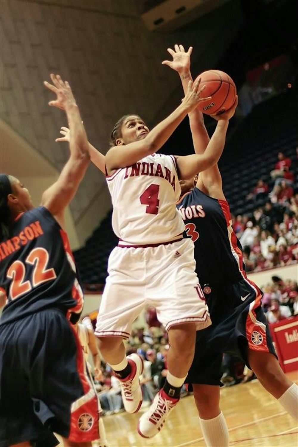 Freshman guard Ashlee Mells splits the Illinois defense on her way to the hoop during the Hoosiers 66-59 loss to Illinois Sunday afternoon at Assembly Hall.