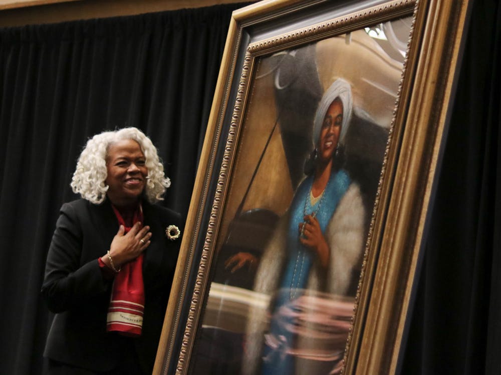 Marietta Simpson rudy professor of voice for the Jacobs School of Music  reacts to the unveiling of the new portrait of world-renowned opera singer Camilla Williams Feb. 5 in the Indiana Memorial Union East Lounge. Williams became the first African American faculty member in the voice department at IU in 1977, and she retired in 1997. 