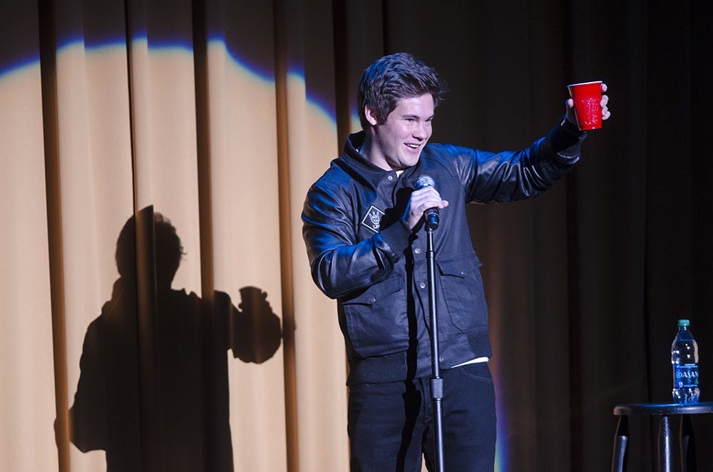 Stand-up comedian Adam DeVine performs at the IU Auditorium on Wednesday. Devine is widely known for his role on Workaholics. 
