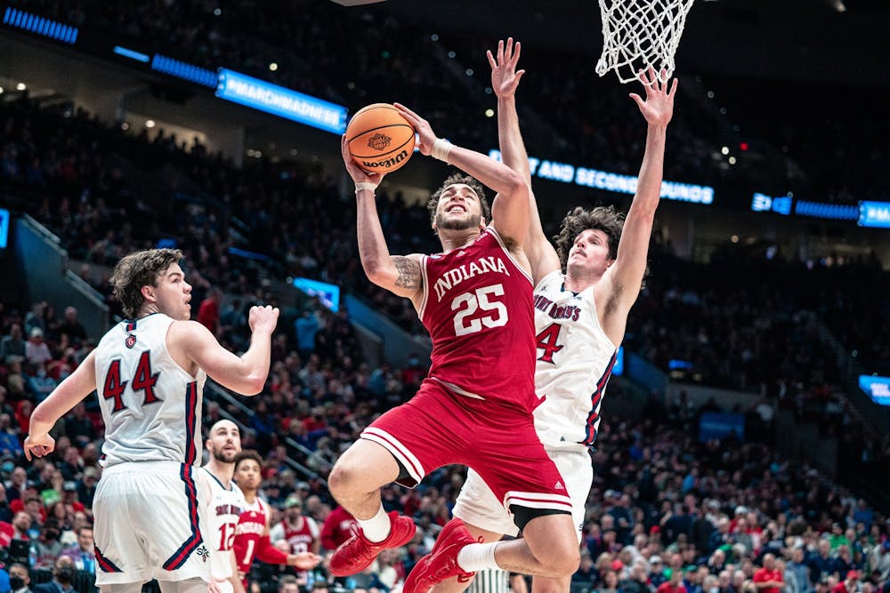 <p>Then-senior forward Race Thompson attempts a layup March 17, 2022, at the Moda Center in Portland, Oregon. Thompson had his best game of the season in Indiana&#x27;s win against Little Rock.</p>