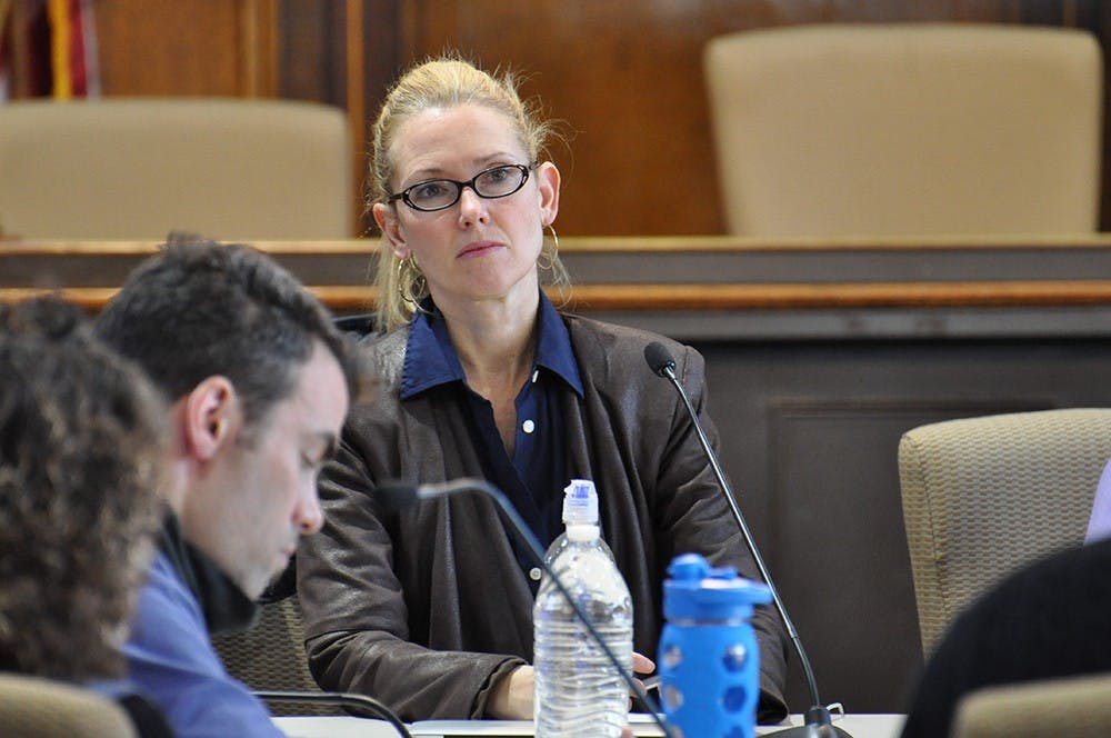 Shelli Yoder listens as the Monroe County Council hears a report on the Anthem Data Breach Tuesday evening Monroe County Courthouse.