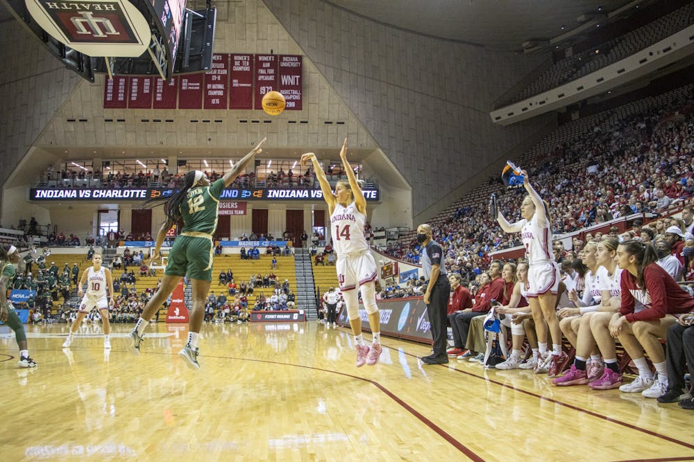 <p>Graduate guard Ali Patberg shoots a three-pointer against University of North Carolina at Charlotte on March 19, 2022, at Simon Skjodt Assembly Hall. Indiana won 85-51 Saturday in the First Round of the NCAA Tournament.</p>