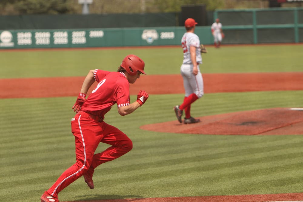 <p>Freshman Brock Tibbitts runs to first base after hitting the ball April 24, 2022, at Bart Kaufman Field. Indiana won its first Big Ten series of the 2022 season with a 2-1 weekend against Nebraska at home.</p>