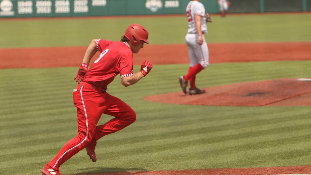 Freshman Brock Tibbitts runs to first base after hitting the ball April 24, 2022, at Bart Kaufman Field. Indiana won its first Big Ten series of the 2022 season with a 2-1 weekend against Nebraska at home.