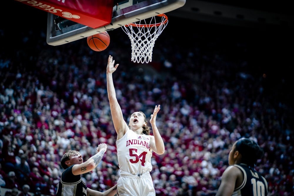 Senior forward Mackenzie Holmes lays in a shot Feb. 19, 2023, at Simon Skjodt Assembly Hall in Bloomington, Indiana. Holmes was awarded her fourth Big Ten Player of the Week honor of the season on Monday.