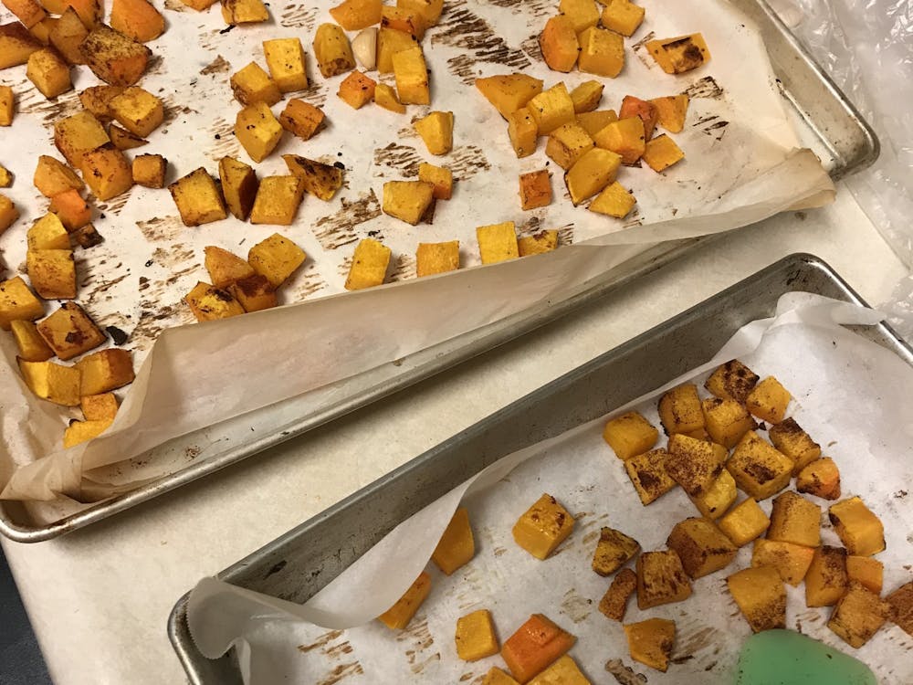 Butternut squash, roasted with a drizzle of olive oil, salt and pepper, can be the perfect at-home tailgate vegetable.