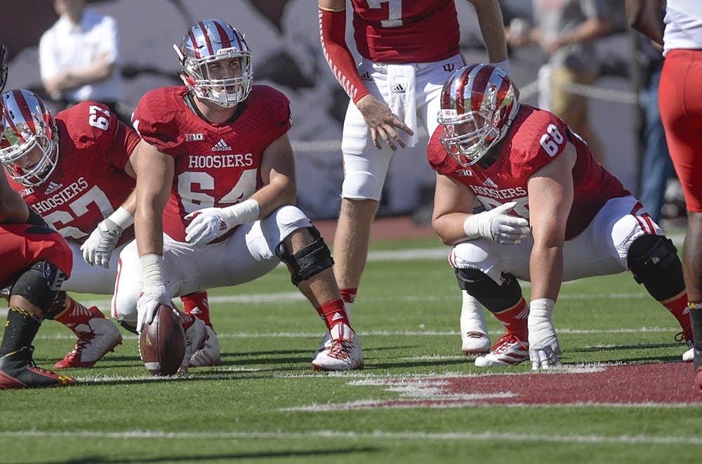 Senior center Collin Rahrig waits for a new play during an audible in IU's game against Maryland on Sept. 27 at Memorial Stadium.