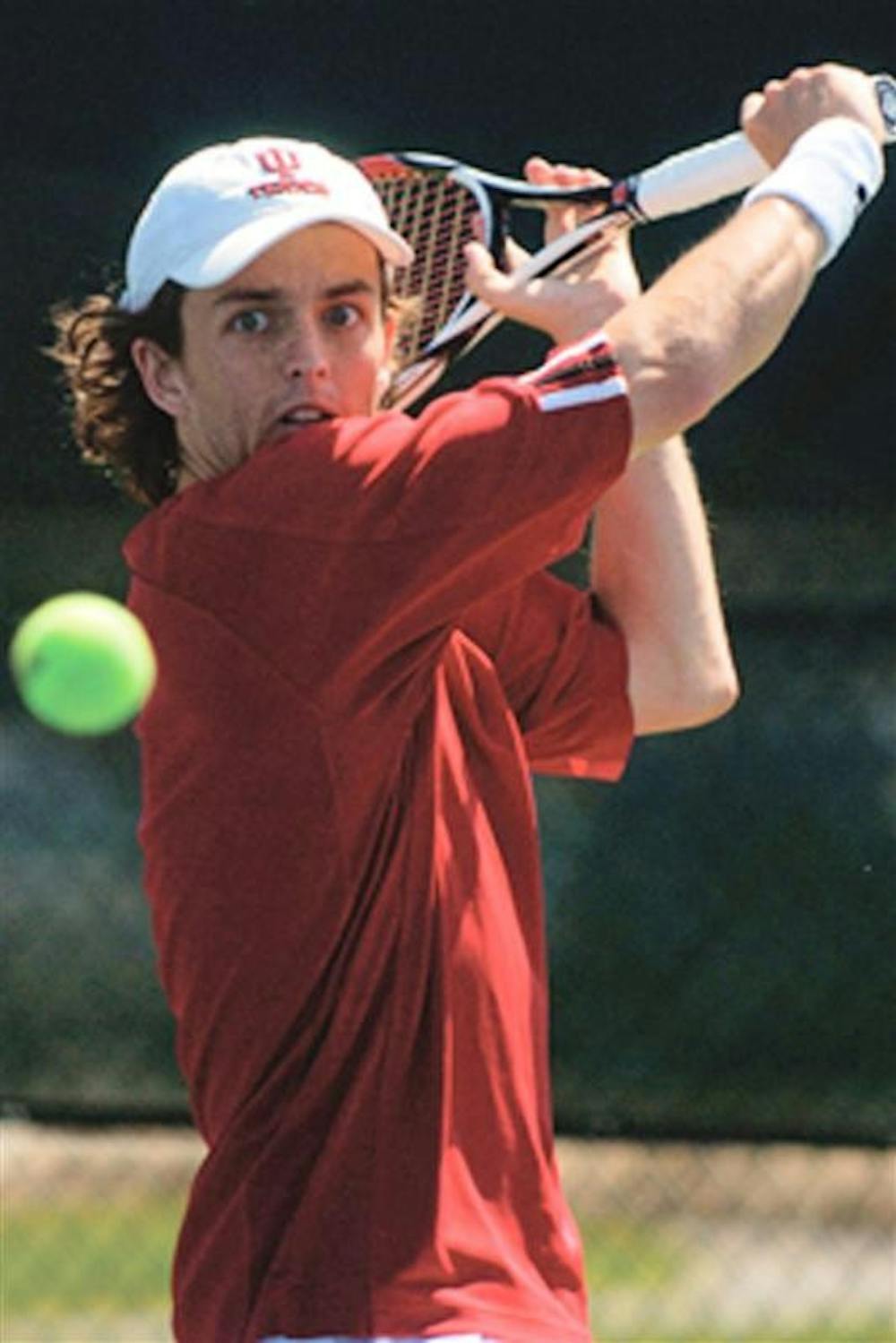 IU sophomore Lachlan Ferguson prepares a backhand shot during a singles match April 8, 2008, at the Varsity Courts. Ferguson was recently named a second-team All-District All-Academic honoree.