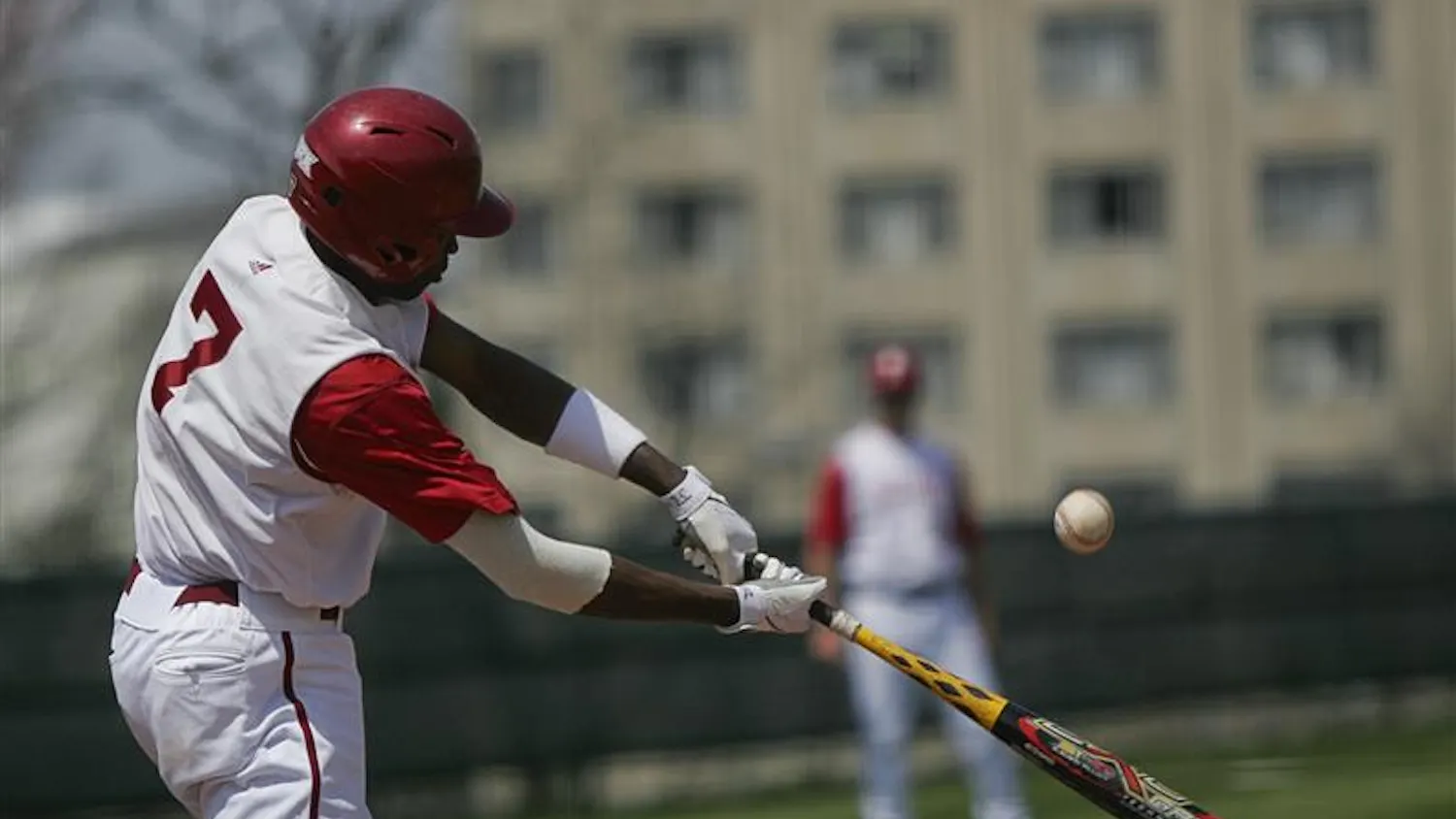 Junior center fielder Evan Crawford swings at the ball Saturday afternoon at Sembower Field. The Hoosiers won 15-1 and 3-2 in a doubleheader against Penn State.