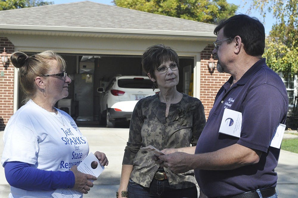 While canvassing in Green Acres, Linton, Sparks and his wife Sharon chat with Tammy Thorton, a resident of the neighborhood, about Sparks' campaign and the upcoming election just ten days before Election Day.