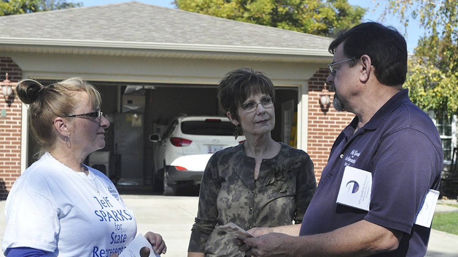 While canvassing in Green Acres, Linton, Sparks and his wife Sharon chat with Tammy Thorton, a resident of the neighborhood, about Sparks' campaign and the upcoming election just ten days before Election Day.