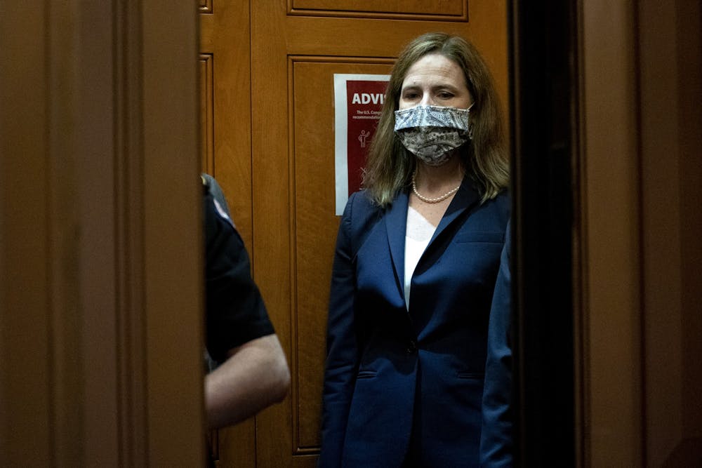 <p>Supreme Court nominee Judge Amy Coney Barrett departs the U.S. Capitol on October 21 in Washington, D.C. The Senate confirmed Barrett&#x27;s nomination with a vote of 52-48. </p>