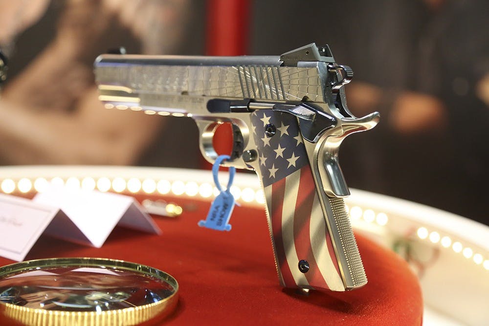 <p>Firearms and related products are displayed and discussed at the 143rd NRA Annual Meeting &amp; Exhibits at the Indiana Convention Center on April 26, 2014. Indiana Senate Republicans signed a resolution honoring the NRATuesday. </p>
