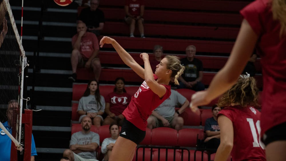 Senior middle blocker Savannah Kjolhede sends the ball over the net Aug. 26, 2023, against the University of Southern Indiana at Wilkinson Hall in Bloomington. Indiana was swept by Wisconsin on Sunday.