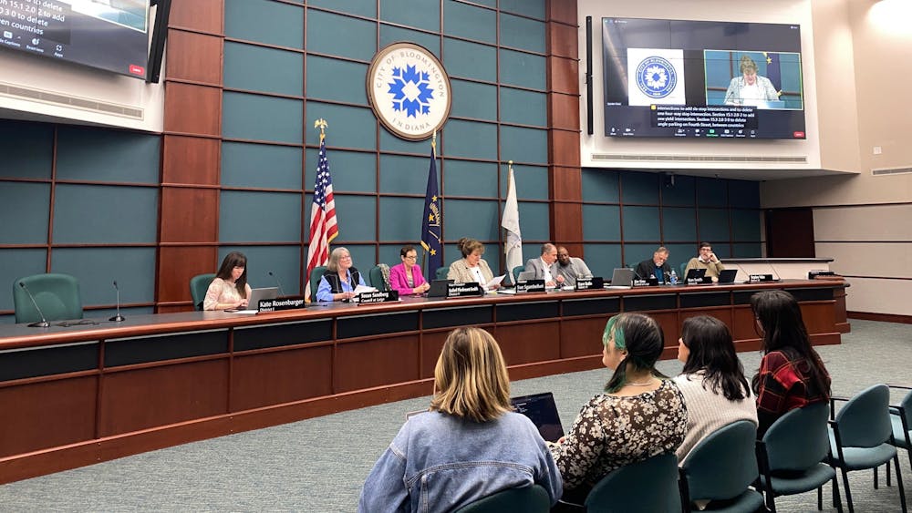 Members of the Bloomington City Council discuss renewing the outdoor dining program, including closing Kirkwood Avenue, during a meeting in City Hall on Feb. 15, 2023. The council voted to postpone the issue of renewing the outdoor dining program to March 1, 2023.