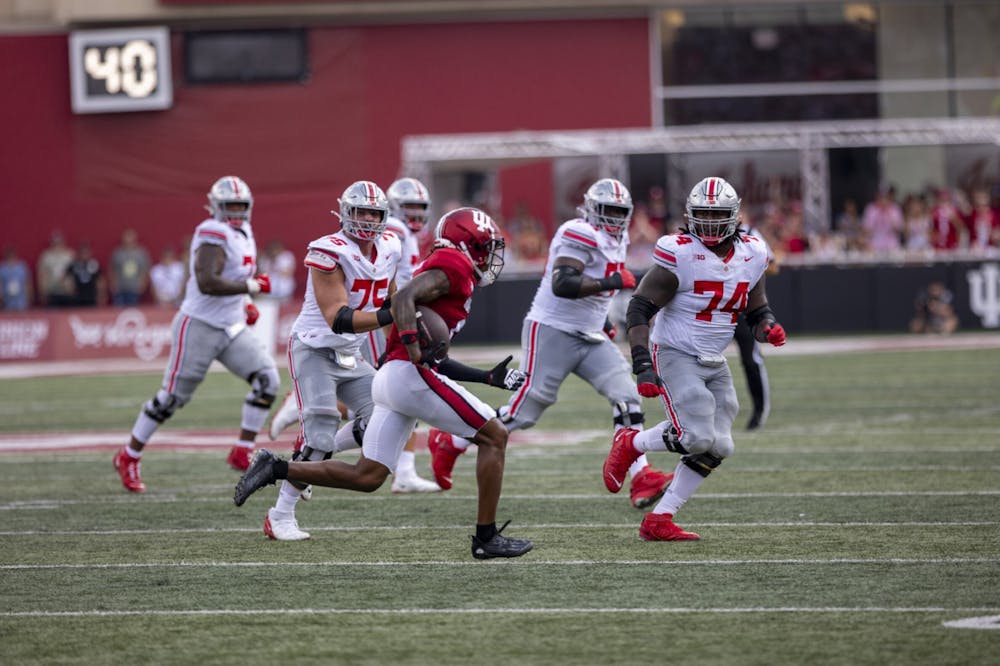 <p>Sophomore defensive back Phillip Dunham returns an interception against Ohio State on Sept. 2, 2023, at Memorial Stadium in Bloomington. Dunham created the unifying group chat for Indiana&#x27;s secondary.</p>