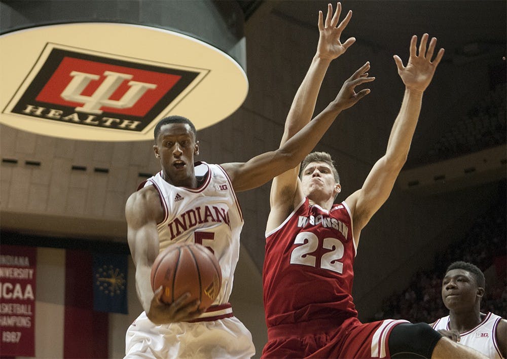 Junior forward Troy Williams grabs the rebound during the game against Wisconsin on Jan. 5 at Assembly Hall. The Hoosiers won, 59-58.