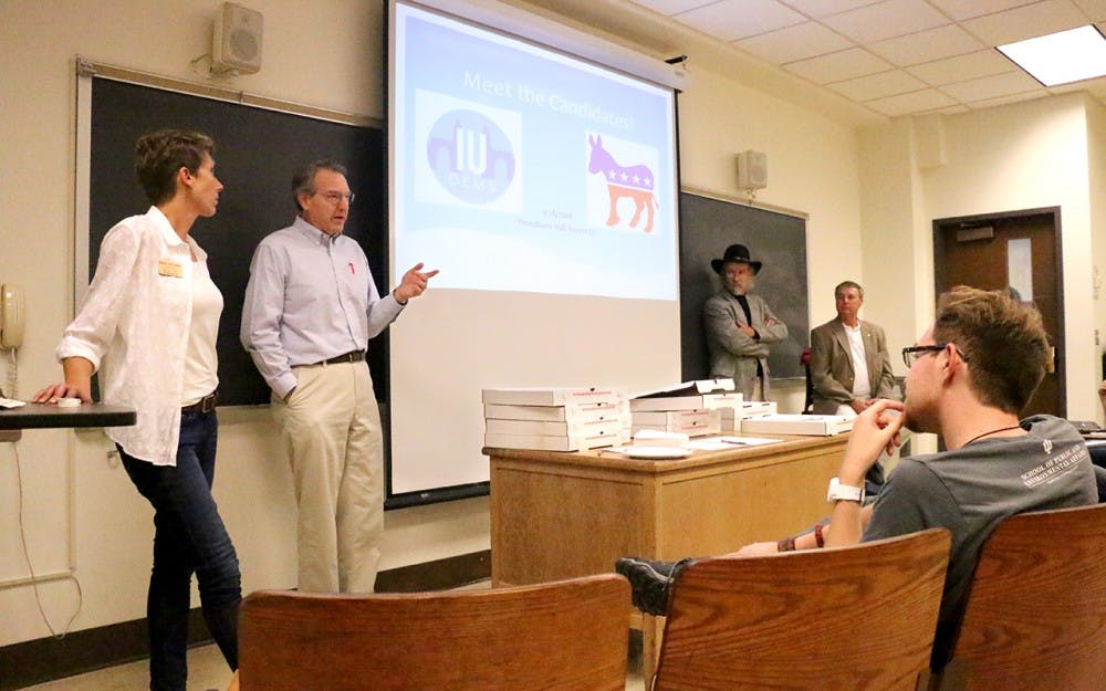 Jessica McClellan and Matt Pierce answer senior Ari Hoffman's question about Indiana politics. Both McClellan and Pierce took part in a "Meet the Candidates" information night sponsered by IU Dems at 7pm Wednesday night in Woodburn Hall.