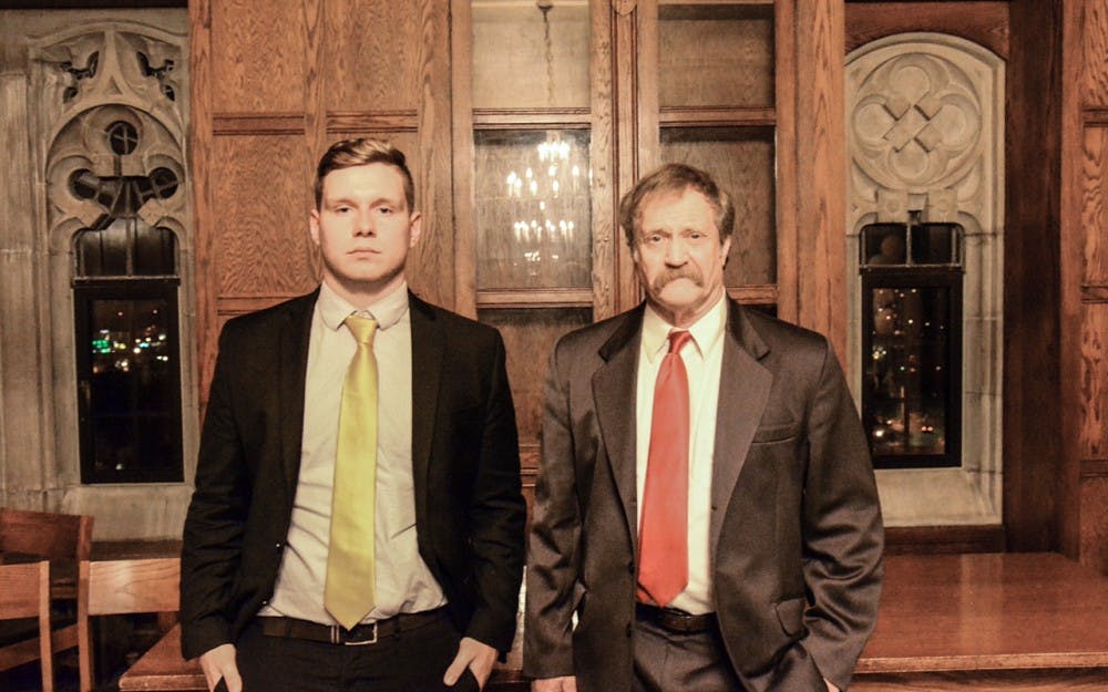 Retired Army Col. Gregg Hammond, right, was initiated into the fraternity Phi Kappa Sigma on Saturday. Jake Olson, left, is the fraternity’s president and said Hammond was a representative of the values of the fraternity. 
